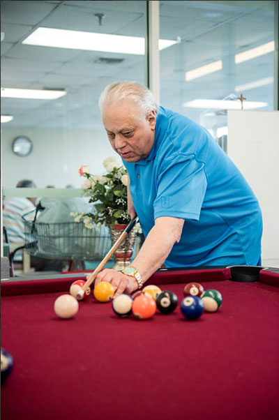 Man shooting pool